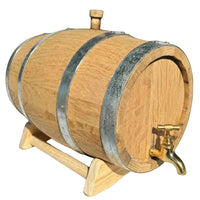 Wooden barrel with a gold faucet on a white background