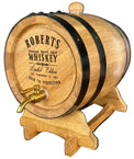Wooden whiskey barrel with 'Roberts Whiskey' branding on a black background